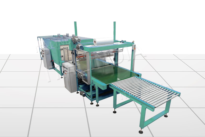 shrink wrapping machine with multiple tracks for feeding products